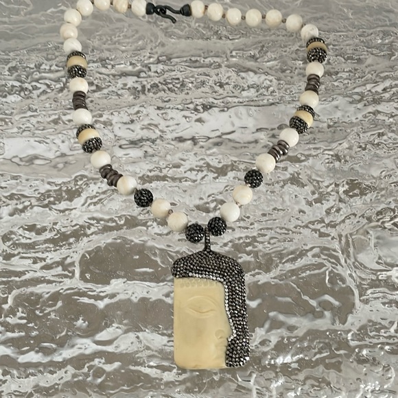 Jewelry - Looks like Buddha face